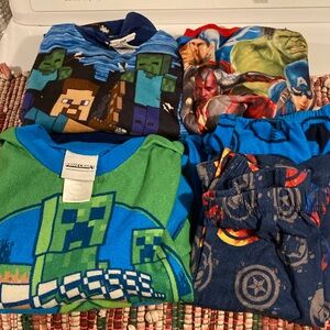 Three pairs of Pjs two pairs are Minecraft Size 8 and Marvel 3 piece Size 6/7
